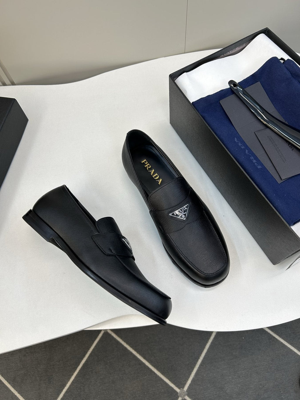 Prada Black Triangular Plaque Loafers